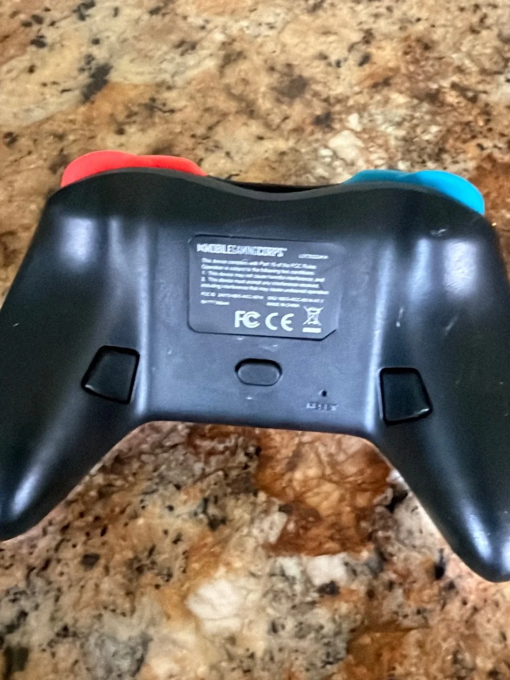 White Wireless Game Controller with Blue & Red Accents